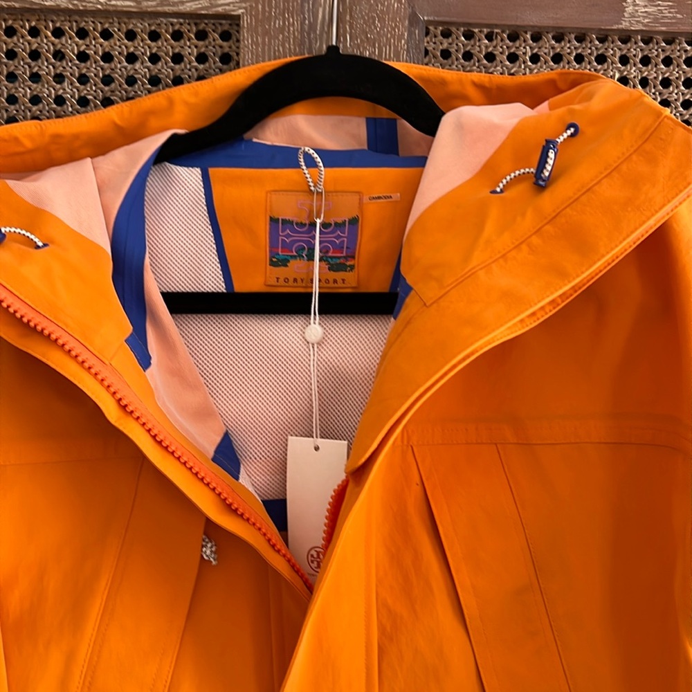 Brand new Tory Burch rain coat